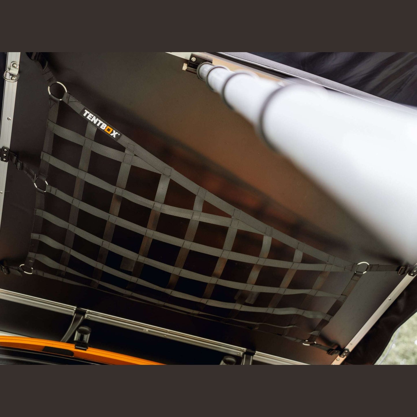 Lite XL Storage Web (Lite XL) Attach this storage web beneath your TentBox Lite XL using the included clips. It’s ideal for drying clothes, storing gear, or hanging lights. Once installed, it can remain in place even when you pack down your TentBox. Compa