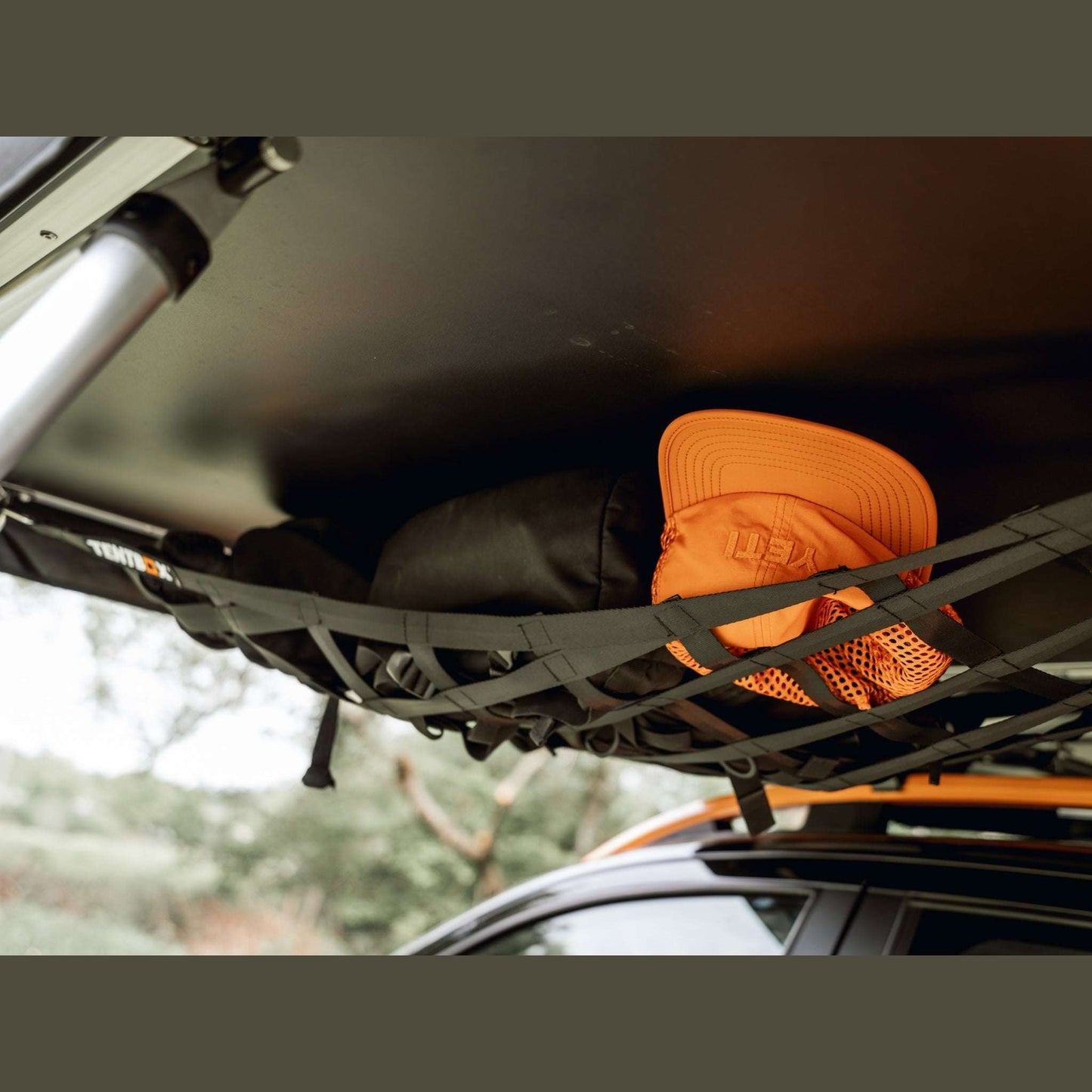 Lite XL Storage Web (Lite XL) Attach this storage web beneath your TentBox Lite XL using the included clips. It’s ideal for drying clothes, storing gear, or hanging lights. Once installed, it can remain in place even when you pack down your TentBox. Compa