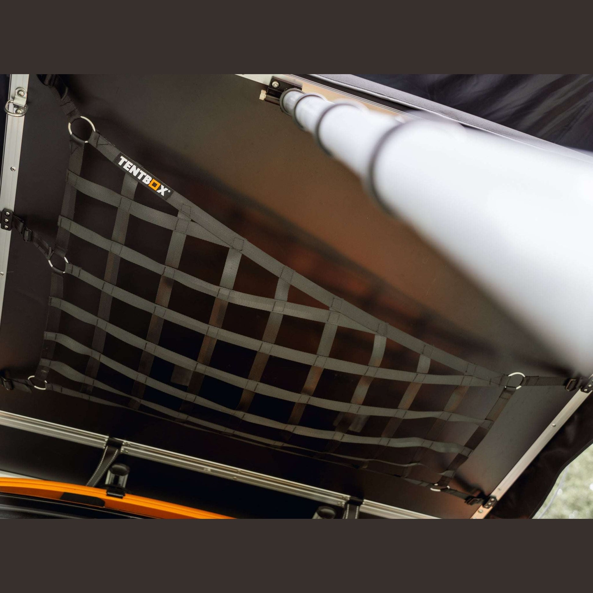 Lite XL Storage Web (Lite XL) Attach this storage web beneath your TentBox Lite XL using the included clips. It’s ideal for drying clothes, storing gear, or hanging lights. Once installed, it can remain in place even when you pack down your TentBox. Compa
