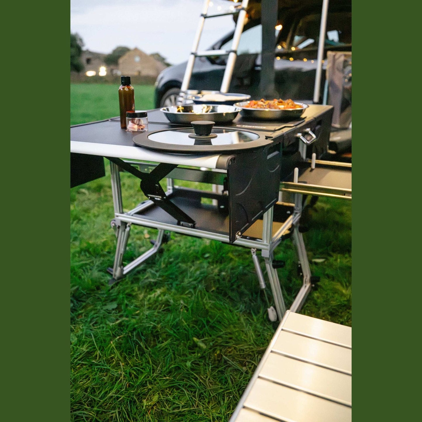 KitchenBox - Complete Camp Kitchen, Includes Stove, Chairs and Cooking Utensils The KitchenBox is a hassle-free kitchen built into a compact box. Easy to carry and designed to fit in your car boot, it sets up in seconds and includes everything you need to