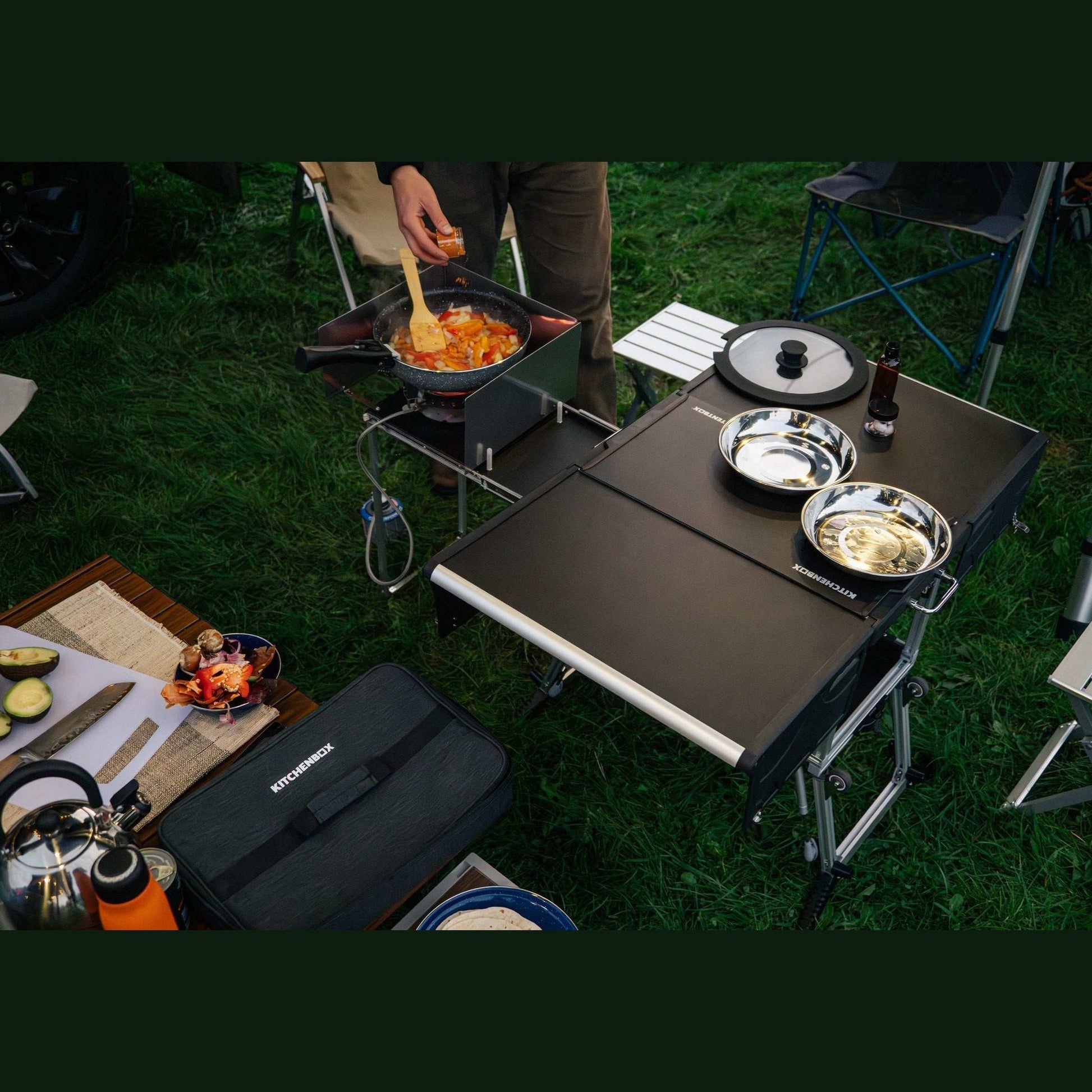 KitchenBox - Complete Camp Kitchen, Includes Stove, Chairs and Cooking Utensils The KitchenBox is a hassle-free kitchen built into a compact box. Easy to carry and designed to fit in your car boot, it sets up in seconds and includes everything you need to