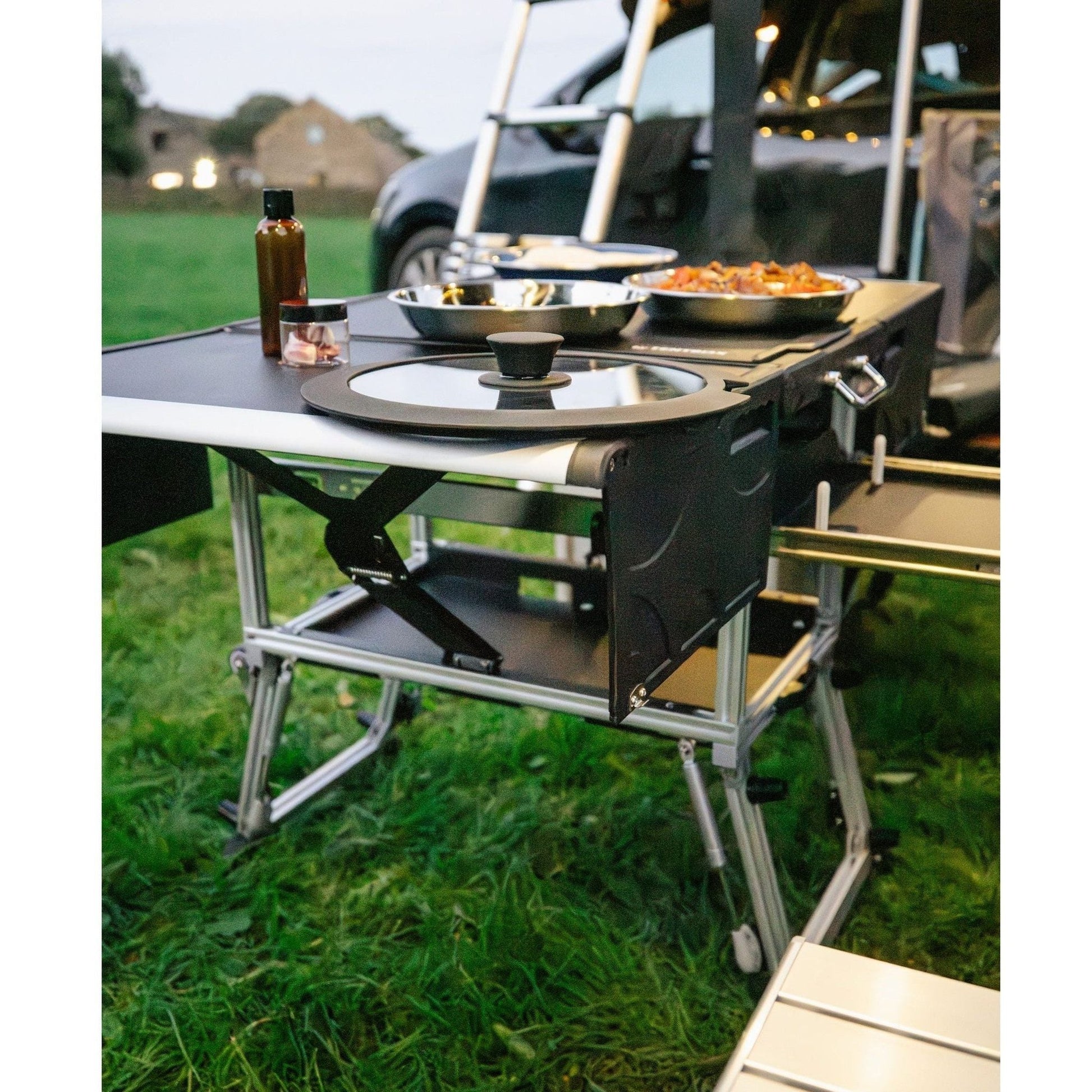 KitchenBox - Complete Camp Kitchen, Includes Stove, Chairs and Cooking Utensils The KitchenBox is a hassle-free kitchen built into a compact box. Easy to carry and designed to fit in your car boot, it sets up in seconds and includes everything you need to