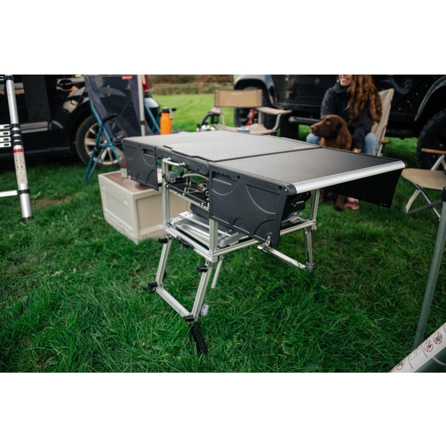 KitchenBox - Complete Camp Kitchen, Includes Stove, Chairs and Cooking Utensils The KitchenBox is a hassle-free kitchen built into a compact box. Easy to carry and designed to fit in your car boot, it sets up in seconds and includes everything you need to