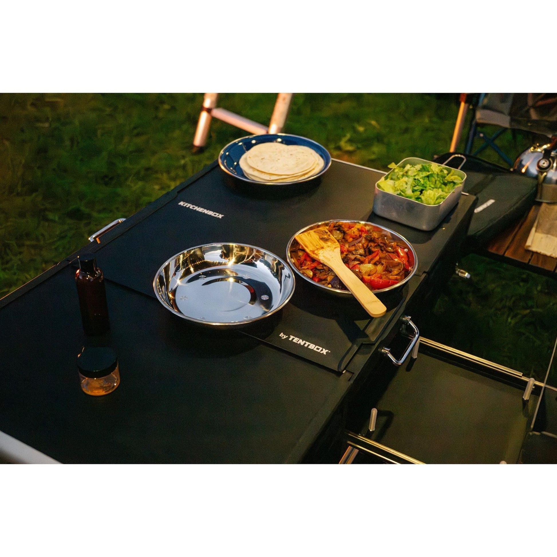 KitchenBox - Complete Camp Kitchen, Includes Stove, Chairs and Cooking Utensils The KitchenBox is a hassle-free kitchen built into a compact box. Easy to carry and designed to fit in your car boot, it sets up in seconds and includes everything you need to