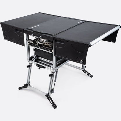 KitchenBox - Complete Camp Kitchen, Includes Stove, Chairs and Cooking Utensils The KitchenBox is a hassle-free kitchen built into a compact box. Easy to carry and designed to fit in your car boot, it sets up in seconds and includes everything you need to
