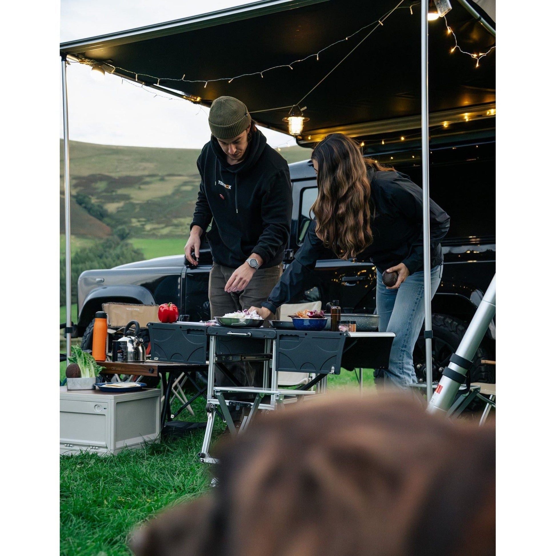 KitchenBox - Complete Camp Kitchen, Includes Stove, Chairs and Cooking Utensils The KitchenBox is a hassle-free kitchen built into a compact box. Easy to carry and designed to fit in your car boot, it sets up in seconds and includes everything you need to