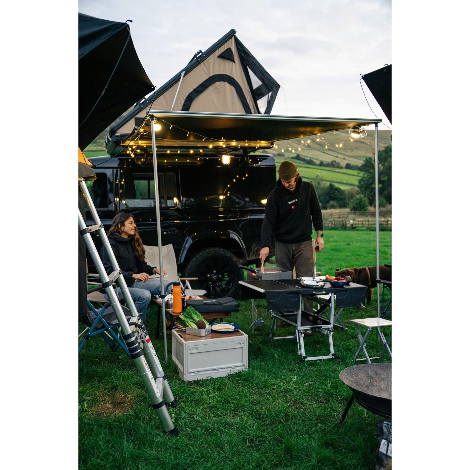 KitchenBox - Complete Camp Kitchen, Includes Stove, Chairs and Cooking Utensils The KitchenBox is a hassle-free kitchen built into a compact box. Easy to carry and designed to fit in your car boot, it sets up in seconds and includes everything you need to