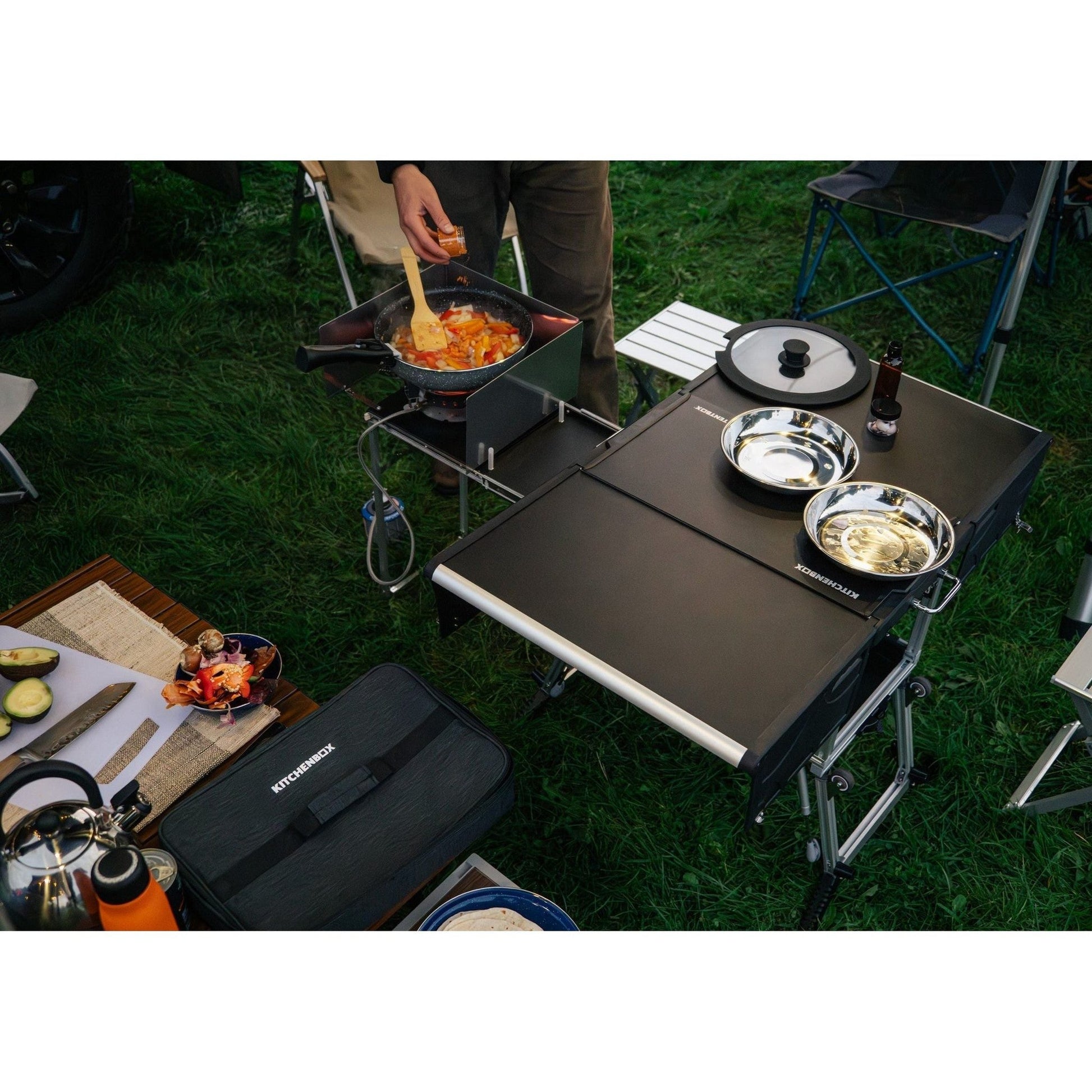 KitchenBox - Complete Camp Kitchen, Includes Stove, Chairs and Cooking Utensils The KitchenBox is a hassle-free kitchen built into a compact box. Easy to carry and designed to fit in your car boot, it sets up in seconds and includes everything you need to