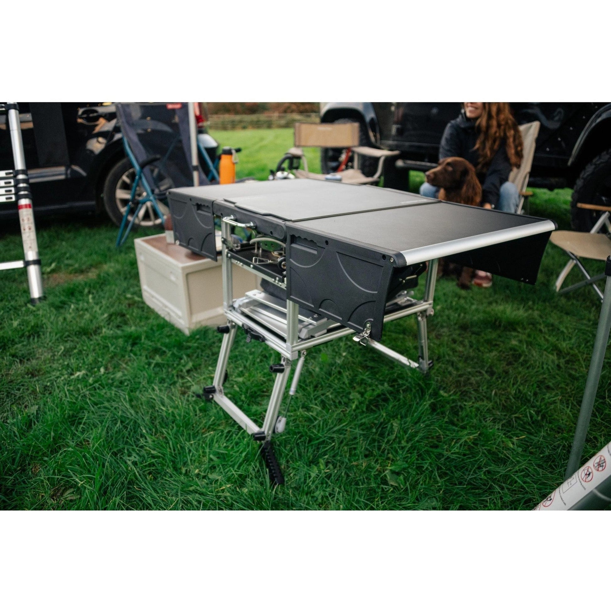 KitchenBox - Complete Camp Kitchen, Includes Stove, Chairs and Cooking Utensils The KitchenBox is a hassle-free kitchen built into a compact box. Easy to carry and designed to fit in your car boot, it sets up in seconds and includes everything you need to